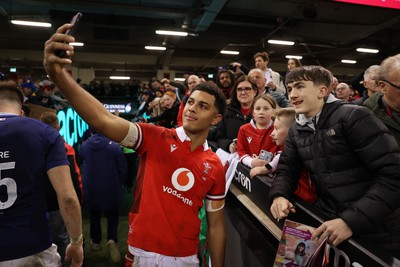 100324 - Wales v France - Guinness 6 Nations Championship - Rio Dyer of Wales with fans