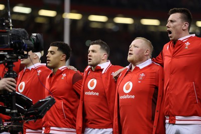 100324 - Wales v France - Guinness 6 Nations Championship - Ellot Dee of Wales sings the anthem