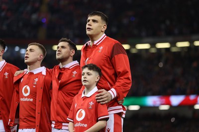 100324 - Wales v France - Guinness 6 Nations Championship - Dafydd Jenkins of Wales sings the anthem