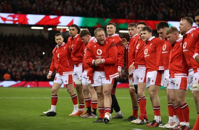 100324 - Wales v France - Guinness 6 Nations Championship - Corey Domachowski of Wales pumps the team up