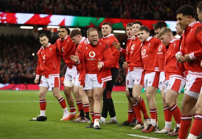 100324 - Wales v France - Guinness 6 Nations Championship - Corey Domachowski of Wales pumps the team up