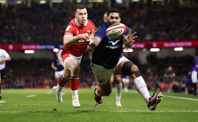 100324 - Wales v France Guinness 6 Nations - Romain Taofifenua of France beats Gareth Davies of Wales to score try