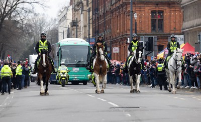 100324 - Wales v France Guinness 6 Nations - Police horses escort the French team coach to the stadium