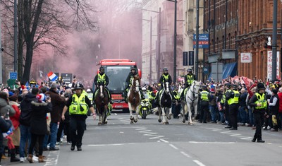 100324 - Wales v France Guinness 6 Nations - Police horses escort the Welsh team coach to the stadium