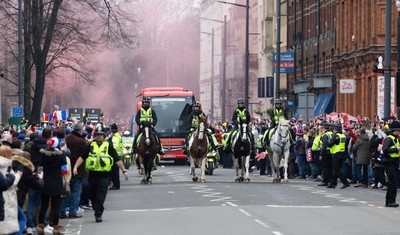 100324 - Wales v France Guinness 6 Nations - Police horses escort the Welsh team coach to the stadium