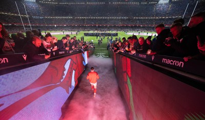 100324 - Wales v France Guinness 6 Nations - Elliot Dee of Wales walks out for his 50th cap