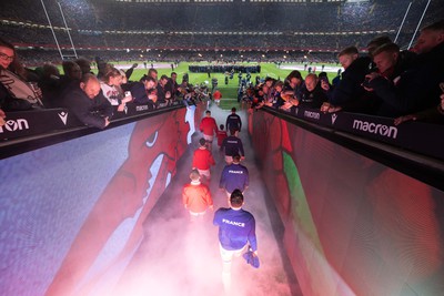 100324 - Wales v France Guinness 6 Nations - The teams walk out at the Principality Stadium at the start of the match