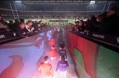 100324 - Wales v France Guinness 6 Nations - The teams walk out at the Principality Stadium at the start of the match