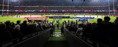 100324 - Wales v France Guinness 6 Nations - The teams line up for the anthems  at the Principality Stadium at the start of the match