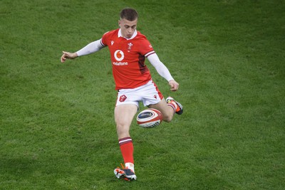 100324 - Wales v France - Guinness Six Nations - Cameron Winnett of Wales kicks the ball