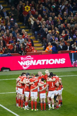 100324 - Wales v France - Guinness Six Nations - Wales team in a huddle before the match