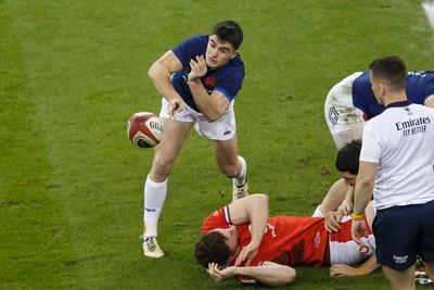 100324 - Wales v France - Guinness Six Nations - Nolann Le Garrec of France passes the ball