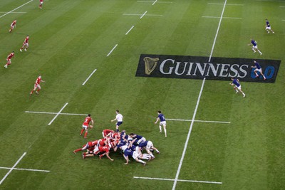 100324 - Wales v France - Guinness Six Nations - Tomos Williams of Wales gets his backs moving from a scrum