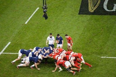 100324 - Wales v France - Guinness Six Nations - Nolann Le Garrec of France prepares to feed a scrum as the spider cam looks down from above