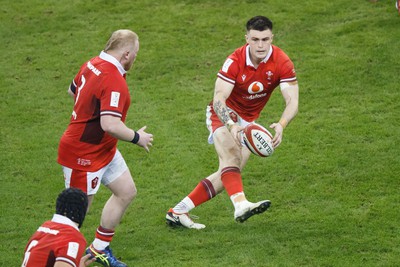 100324 - Wales v France - Guinness Six Nations - Joe Roberts of Wales passes the ball