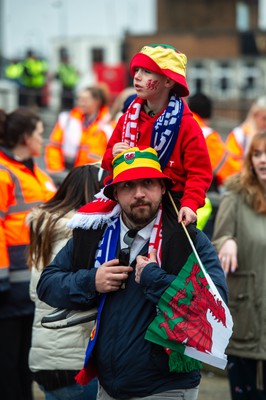 100324 - Wales v France - Guinness Six Nations - Fans in the streets outside the stadium before the match