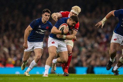 100324 - Wales v France - Guinness Six Nations - Thomas Ramos of France is tackled by Aaron Wainwright of Wales