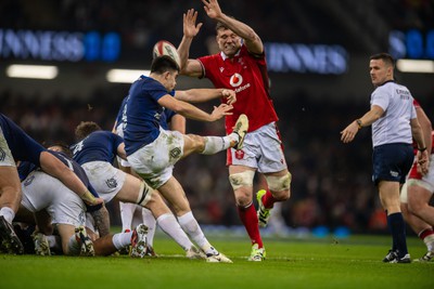 100324 - Wales v France - Guinness Six Nations - Will Rowlands of Wales tries to charge down the kick by Nolann Le Garrec of France