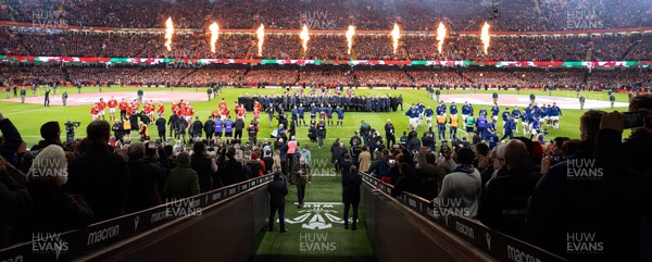 100324 - Wales v France Guinness 6 Nations - The teams line up for the anthems  at the Principality Stadium at the start of the match