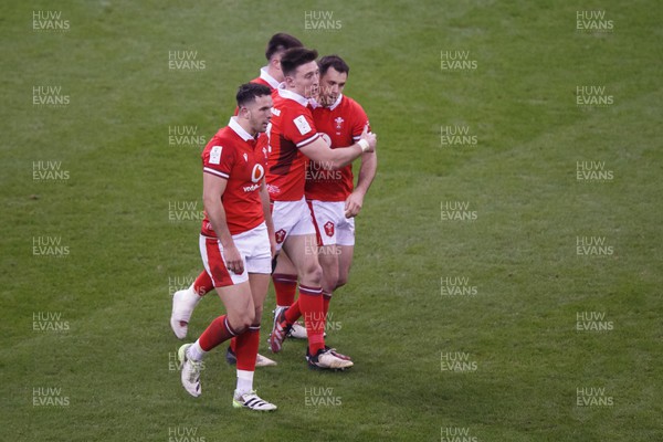 100324 - Wales v France - Guinness Six Nations - Tomos Williams of Wales is congratulated after scoring a try