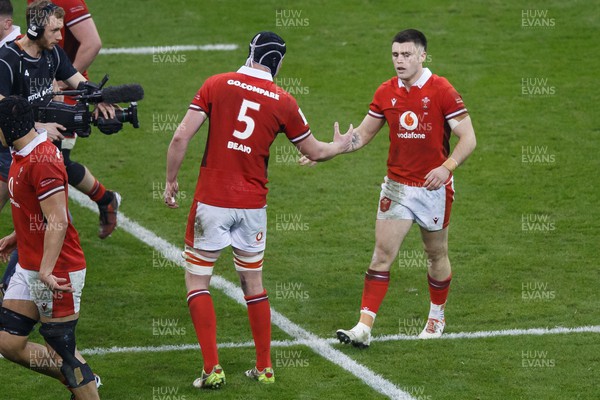 100324 - Wales v France - Guinness Six Nations - Joe Roberts of Wales is congratulated by Adam Beard after scoring a try