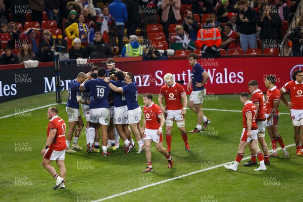 100324 - Wales v France - Guinness Six Nations - France celebrates after Maxime Lucu of France scores a try