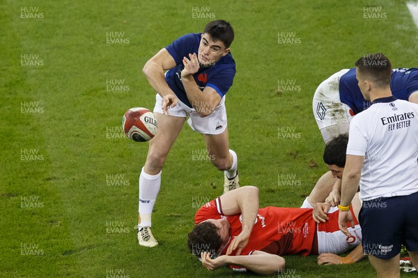 100324 - Wales v France - Guinness Six Nations - Nolann Le Garrec of France passes the ball