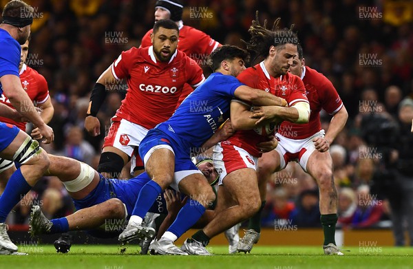 110322 - Wales v France - Guinness Six Nations - Josh Navidi of Wales is tackled by Romain Ntamack of France