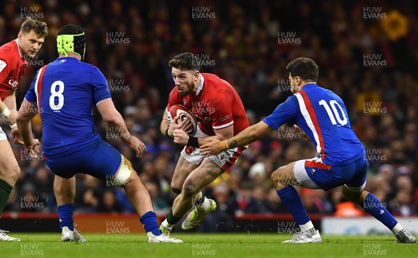 110322 - Wales v France - Guinness Six Nations - Alex Cuthbert of Wales is tackled by Romain Ntamack of France