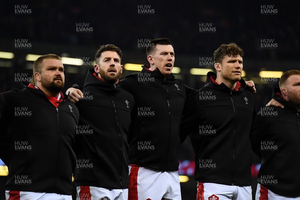 110322 - Wales v France - Guinness Six Nations - Tomas Francis, Alex Cuthbert, Adam Beard, Will Rowlands of Wales during the anthems