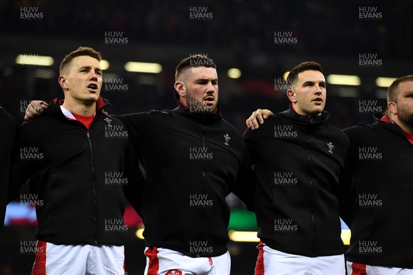 110322 - Wales v France - Guinness Six Nations - Jonathan Davies, Gareth Thomas, Owen Watkin of Wales during the anthems