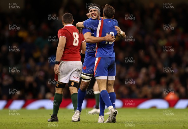110322 - Wales v France - Guinness Six Nations - Dylan Cretin of France celebrates with victory with Romain Ntamack of France
