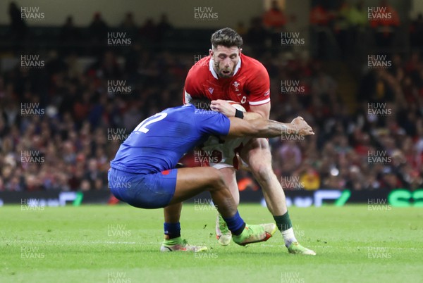 110322 Wales v France, Guinness Six Nations 2022 - Alex Cuthbert of Wales is tackled by Jonathan Danty of France