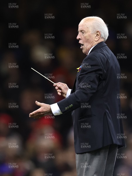 110322 Wales v France, Guinness Six Nations 2022 - Director of Music Dr Haydn James leads the choir as they entertain the crowd at the Principality Stadium ahead of the start of the match