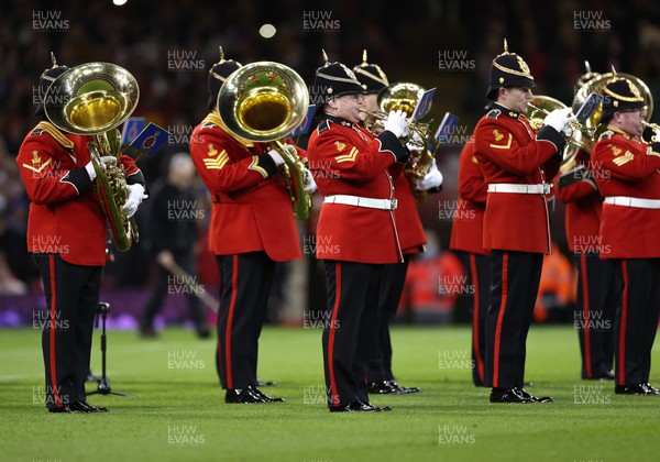 110322 Wales v France, Guinness Six Nations 2022 - The Regimental Band and Corps of Drum of the Royal Welsh entertain the crowd at the Principality Stadium ahead of the start of the match