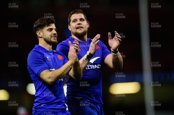 110322 - Wales v France - Guinness Six Nations - Romain Ntamack of France  and Paul Willemse of France applaud the fans