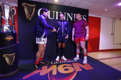 150226 - Wales v France - Guinness Six Nations Championship - Captains Antoine Dupont of France and Dewi Lake of Wales during the coin toss