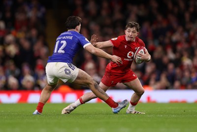 150226 - Wales v France - Guinness Six Nations Championship - Dan Edwards of Wales is tackled by Fabien Brau-Boirie of France 