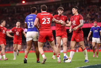 150226 - Wales v France - Guinness Six Nations Championship - Mason Grady of Wales celebrates scoring a try with team mates