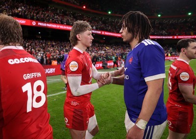 150226 - Wales v France - Guinness Six Nations Championship - Ellis Mee of Wales shakes hands with the opposition at full time