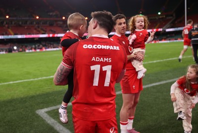 150226 - Wales v France - Guinness Six Nations Championship - Josh Adams of Wales with family at full time