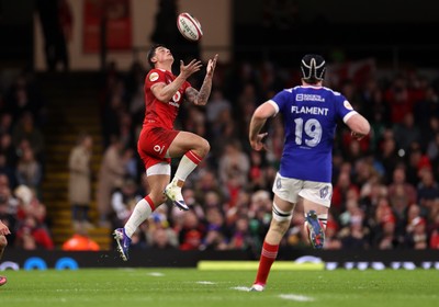 150226 - Wales v France - Guinness Six Nations Championship - Louis Rees-Zammit of Wales get the high ball