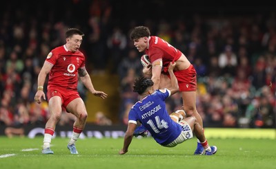 150226 - Wales v France, 2026 Guinness Six Nations - Eddie James of Wales takes on Theo Attissogbe of France