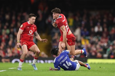 150226 - Wales v France, 2026 Guinness Six Nations - Eddie James of Wales takes on Theo Attissogbe of France