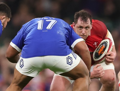 150226 - Wales v France, 2026 Guinness Six Nations - Ryan Elias of Wales takes on Rodrigue Neti of France
