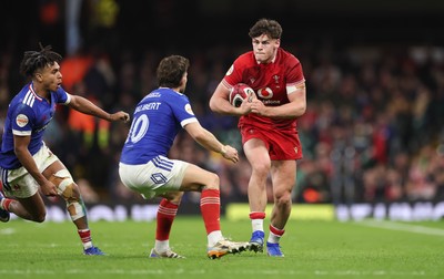 150226 - Wales v France, 2026 Guinness Six Nations - Eddie James of Wales takes on Matthieu Jalibert of France
