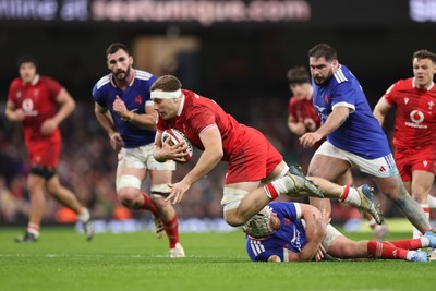 150226 - Wales v France, 2026 Guinness Six Nations - Ben Carter of Wales is tackled