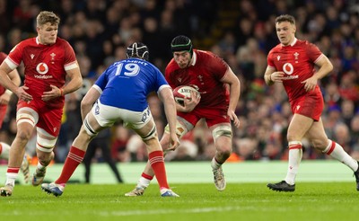 150226 - Wales v France, 2026 Guinness Six Nations - Adam Beard of Wales takes on Thibaud Flament of France 