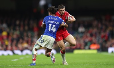 150226 - Wales v France, 2026 Guinness Six Nations - Joe Hawkins of Wales takes on Theo Attissogbe of France 