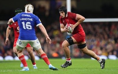 150226 - Wales v France, 2026 Guinness Six Nations - Dafydd Jenkins of Wales takes on Maxime Lamothe of France 